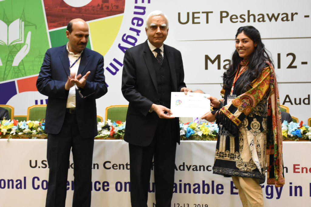 USPCAS-E master’s student Leena Aftab, right, received first prize in the student poster competition. 